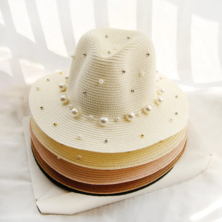 Close-up of faux pearl band wrapped around natural straw weave