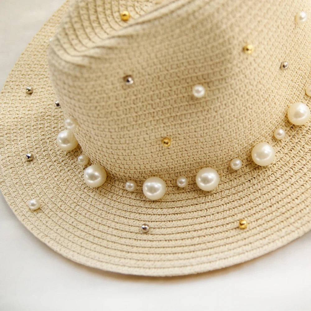 Close-up of faux pearl band wrapped around natural straw weave