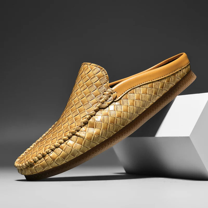 Tan woven loafer on a gray background