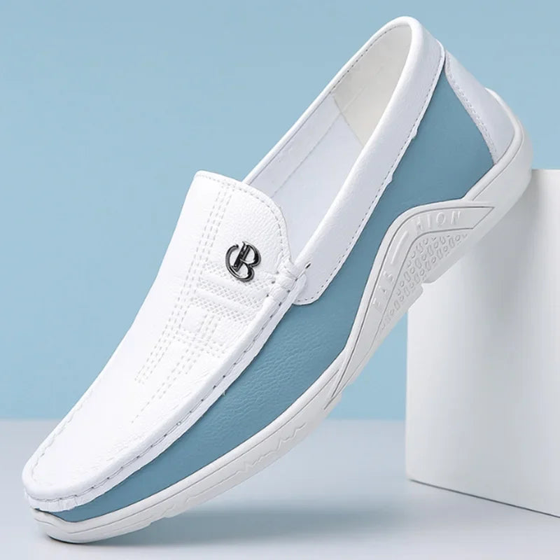White loafers with a small logo on a light blue background