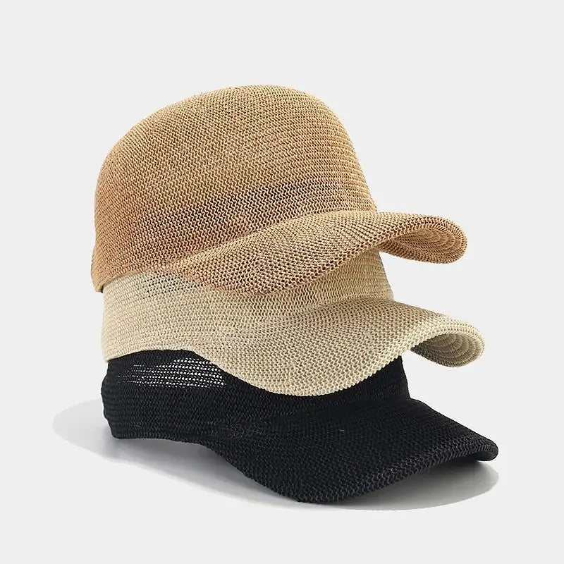 Stacked beige and black woven caps with a classic curved brim and adjustable strap.