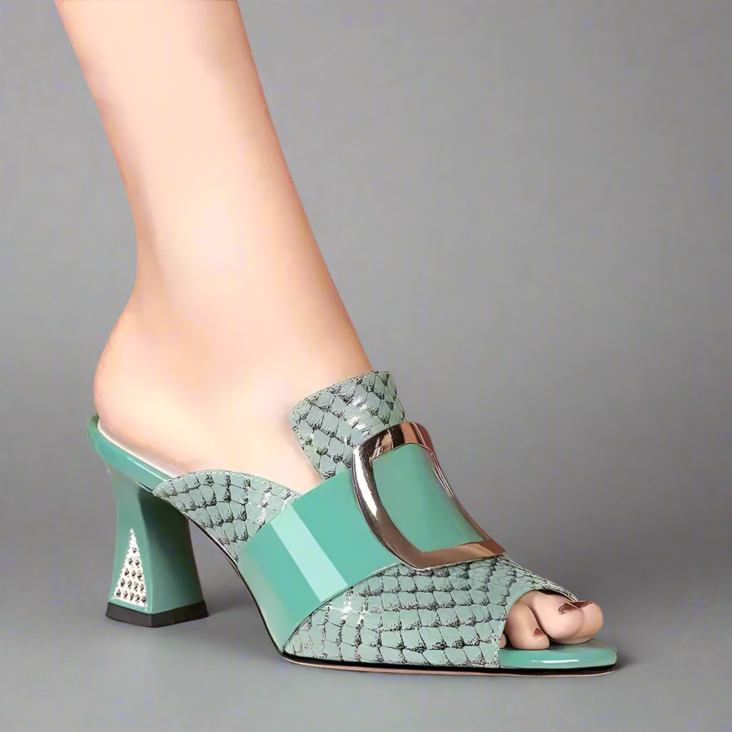Teal high-heeled shoes with woven design on a neutral background