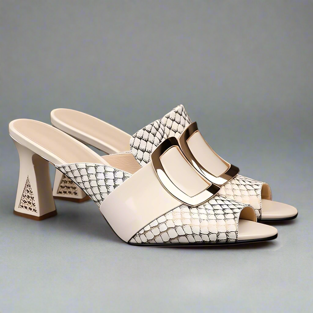 Pair of high-heeled shoes with snake print and gold buckle on a black background